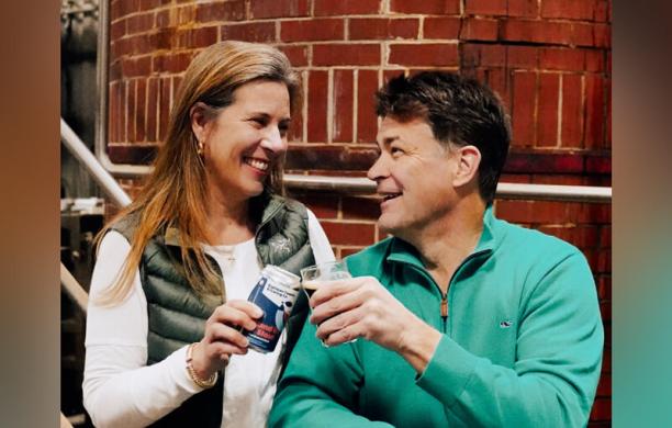 Robin and Alan Lapoint toast with non-alcoholic craft beer