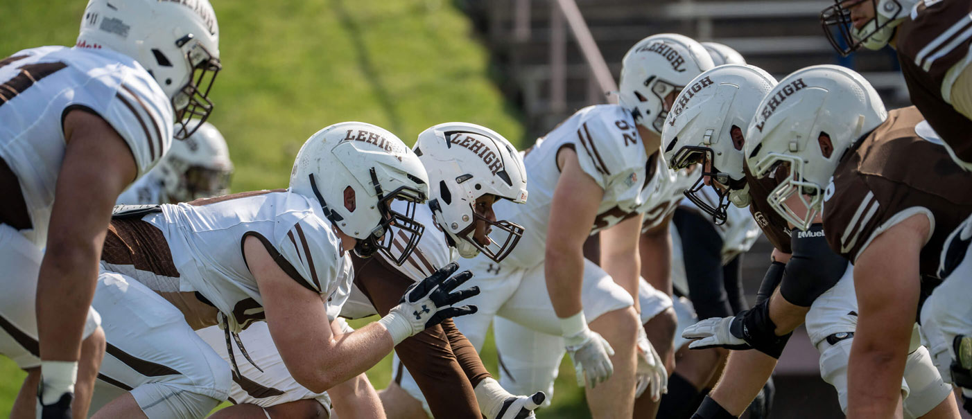 The Lehigh football team in formation and ready to snap the ball.