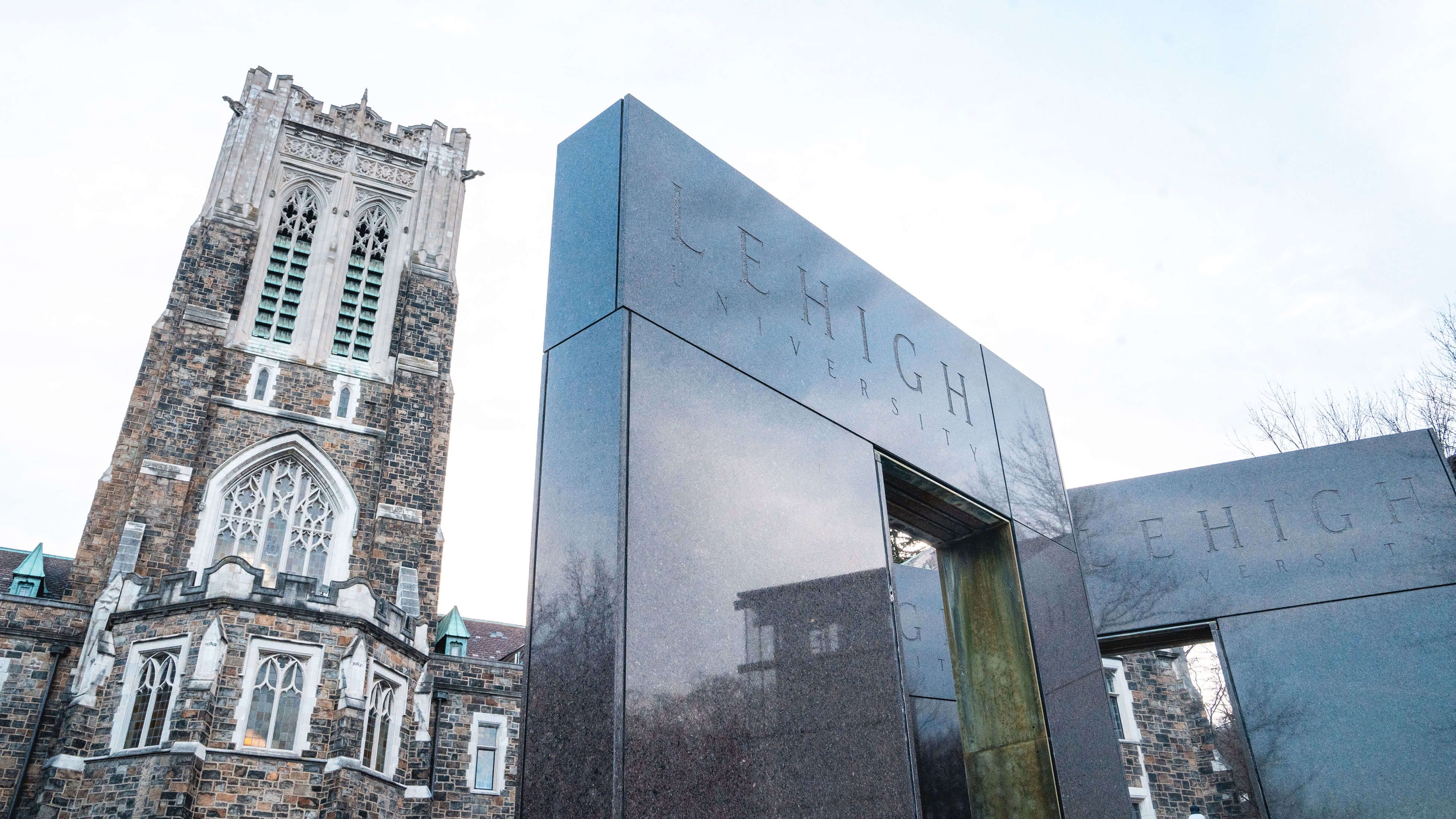 Alumni memorial building behind a Lehigh University fountain