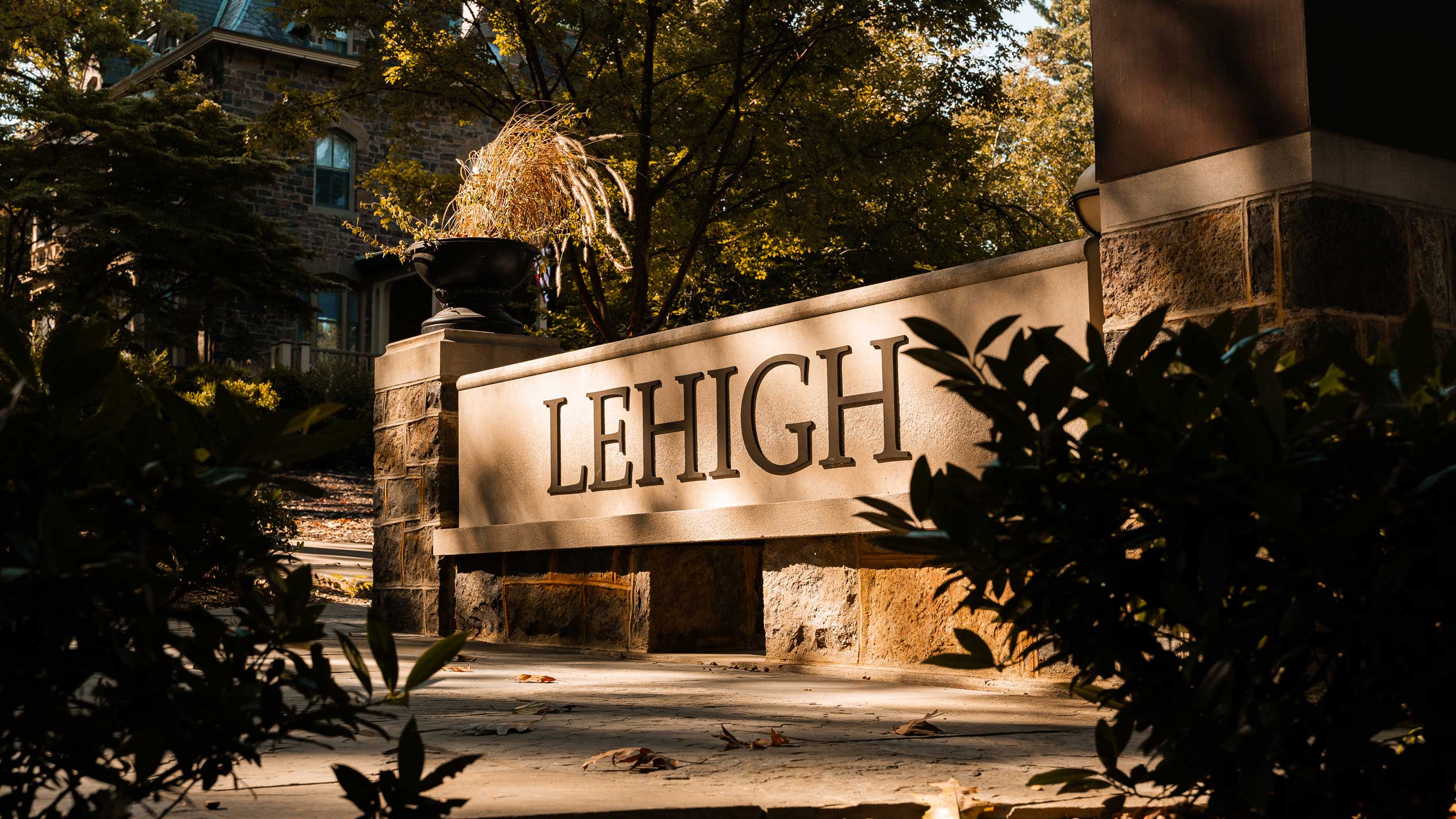 Stone sign reading "Lehigh" in large lettering.