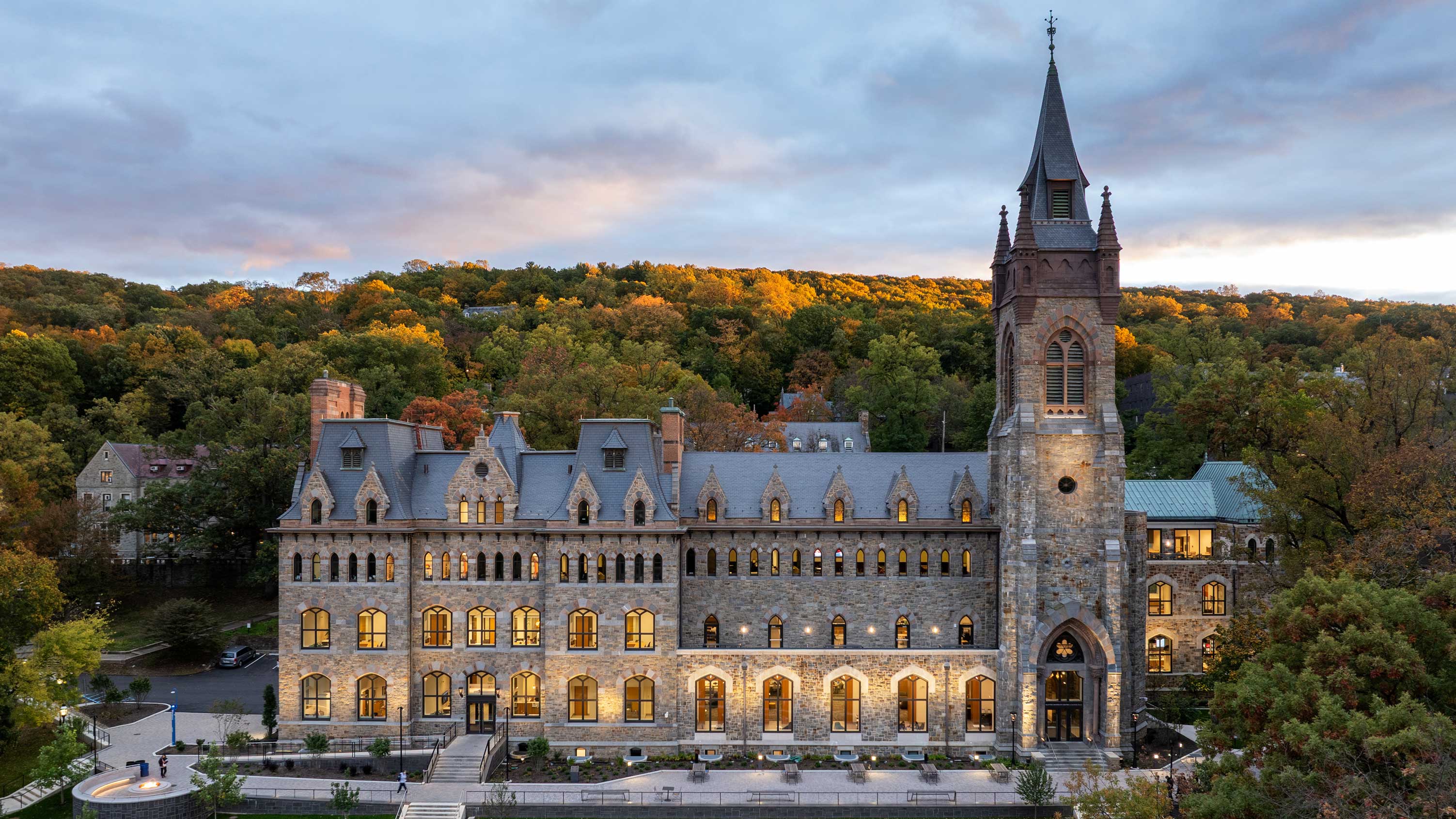 The exterior of the Clayton UC at dusk.