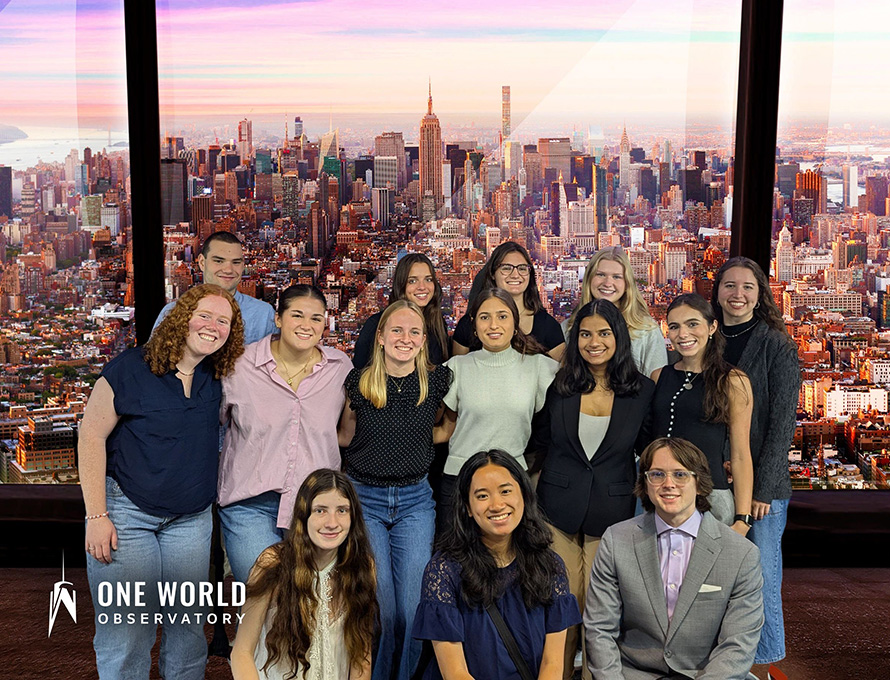 Many Soaring Together Scholars stand for a photo at the top of the World Trade Center Observatory