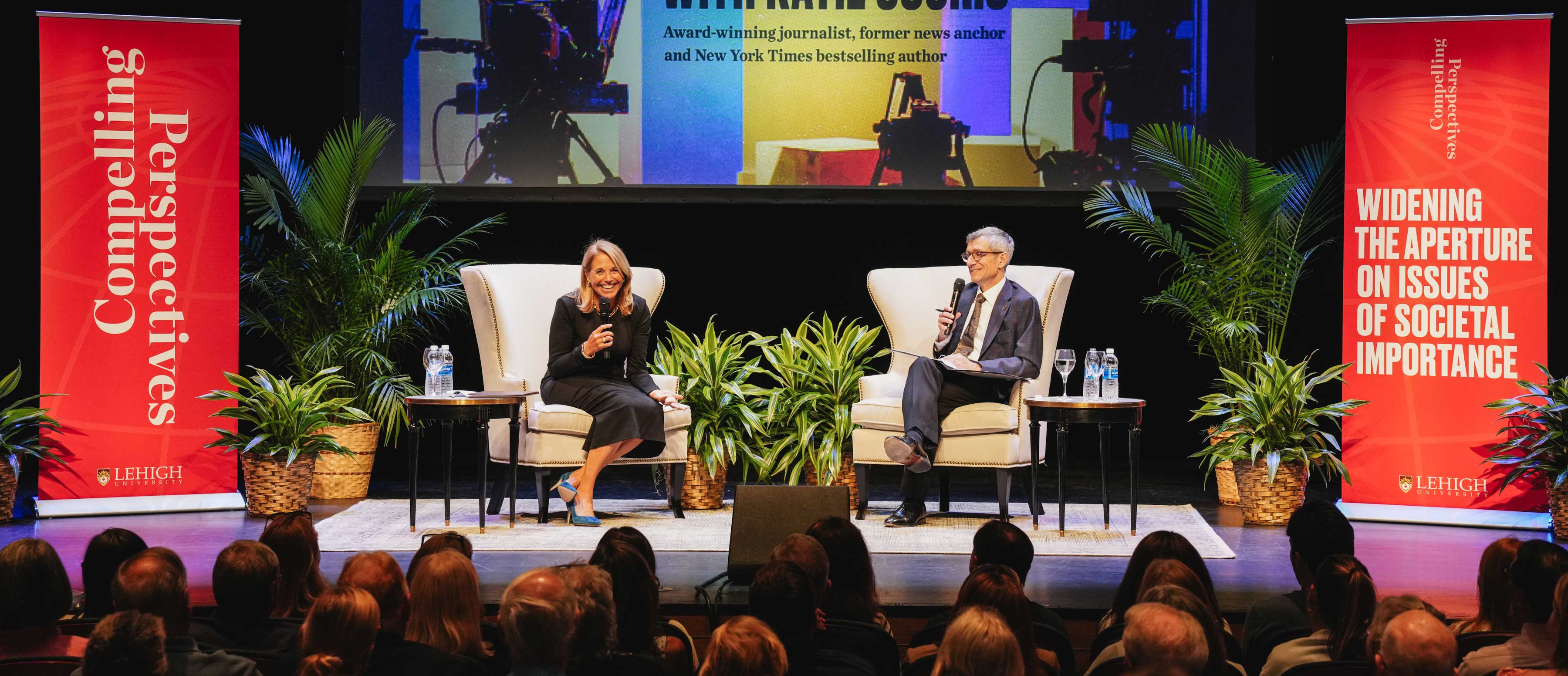 President Helble and Katie Couric seated on a stage and engaged with discussion.