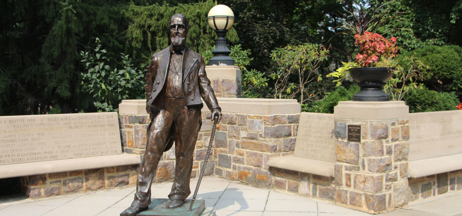 Asa Packer statue surrounded by the stone benches for Leadership Plaza 