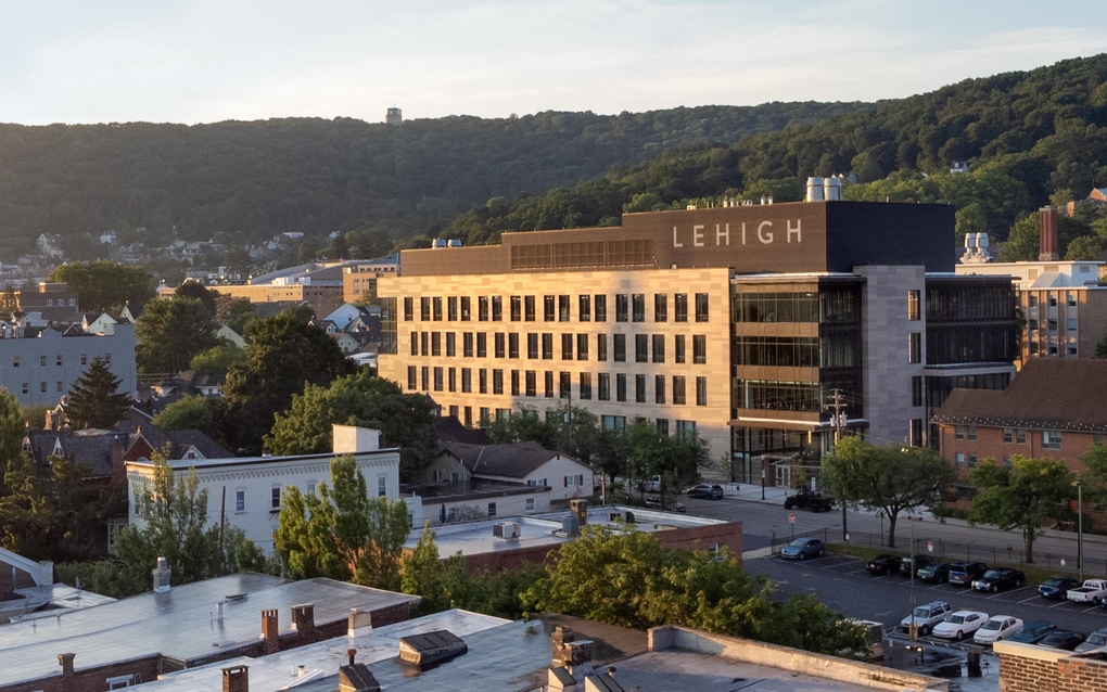 The College of Health's HST (Health, Science, and Technology) building on a day with clear skies