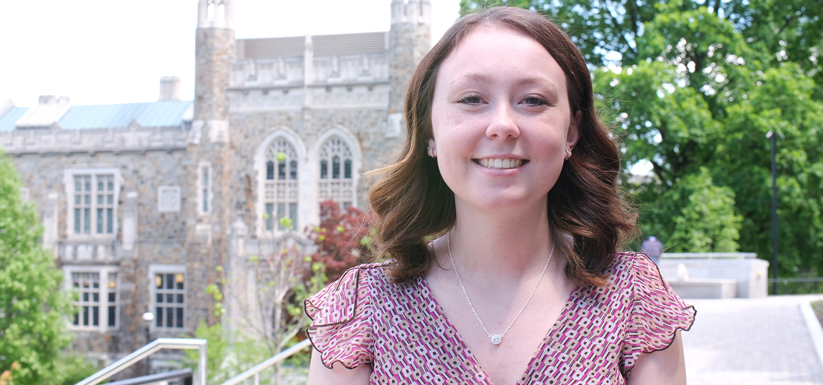Aubrey Hunt stands outside Linderman Library