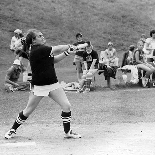 Helen Richardson, '77, hits a grand slam home run during a game against Lafayette in 1977.