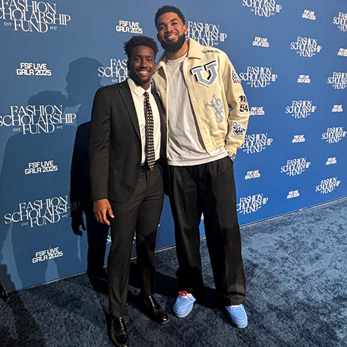 Aaron Williams stands next to Karl-Anthony Towns Jr. at the Fashion Scholarship Gala