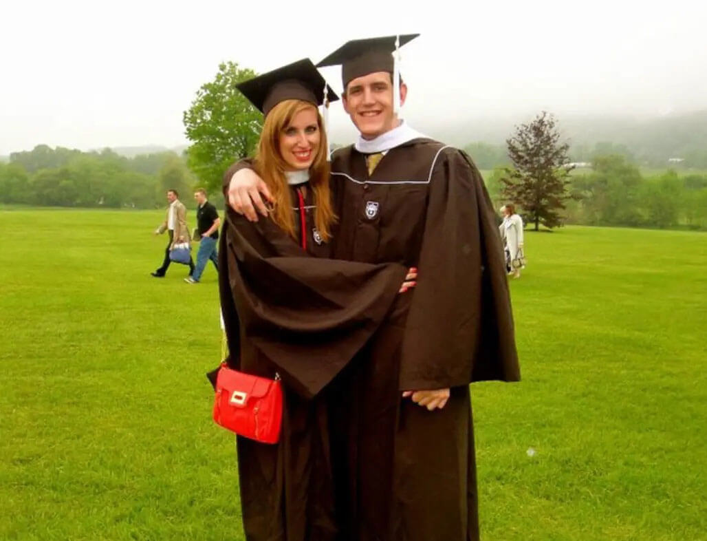 Alexandra and Sebastian Grant standing together in their caps and gowns on graduation day.