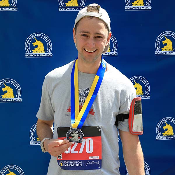 Evan with his Boston Marathon medal