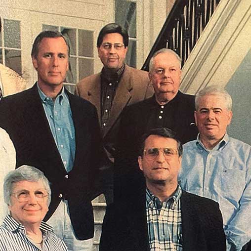Bruce and other Lehigh and Lafayette alumni stand together in the Hotel Bethlehem after they purchased the space.