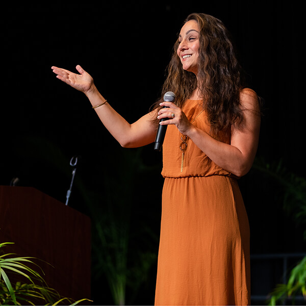 Elizabeth Ortiz speaks at a conference