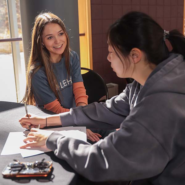 Student worker helps fellow student