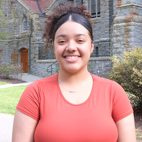 Alyssa Morales '25 stands near Packer Memorial Chapel