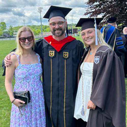 Professor Matt Veto stands in the center with Allie Hite on his left and Madison Hite on his right