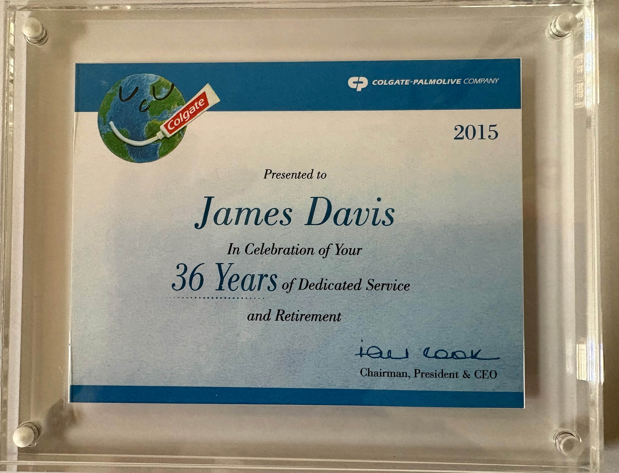 Colgate-Palmolive recognition plaque that reads: “Presented to James Davis in celebration of your 36 years of dedicated service and retirement.”