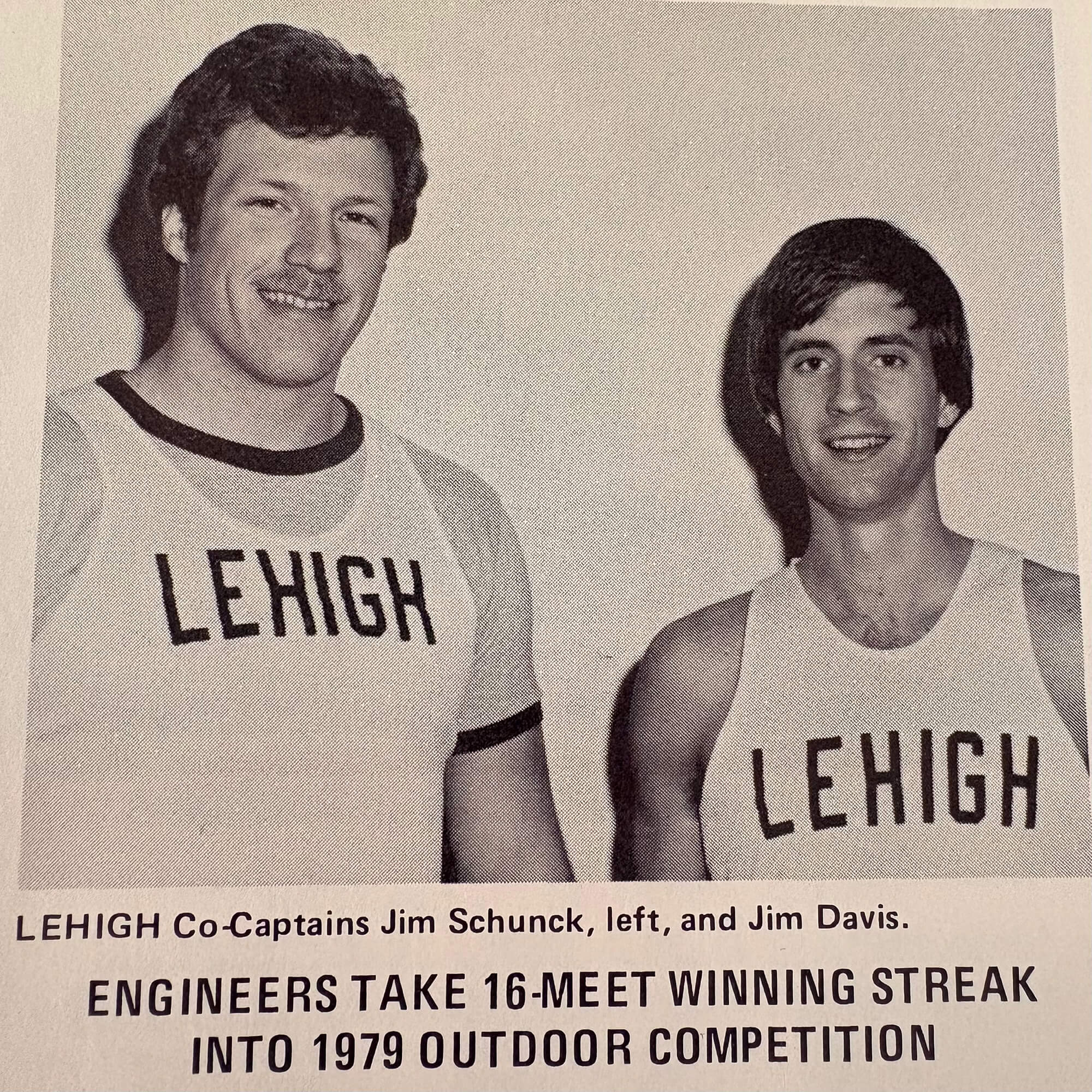 A black and white article of two men wearing Lehigh athletic tanks smiling over the headline: “Engineers take 16-meet winning streak into the 1979 outdoor competition.”