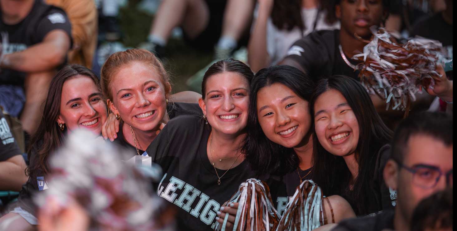 Students smile and pose for a group photo at the Rally.