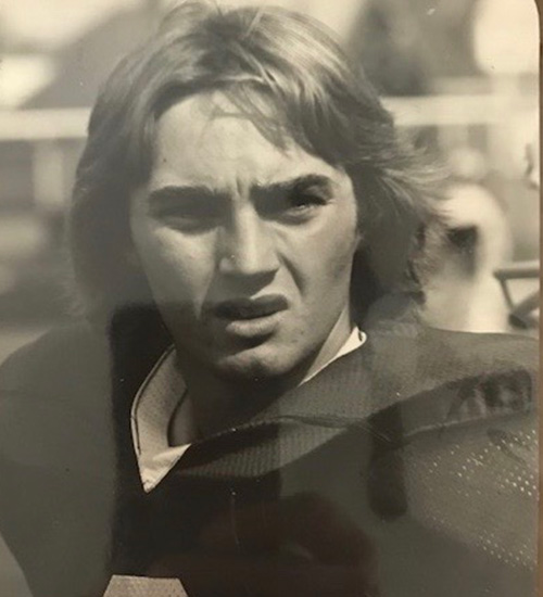 Lyle Hogg in 1976 in football jersey and pads
