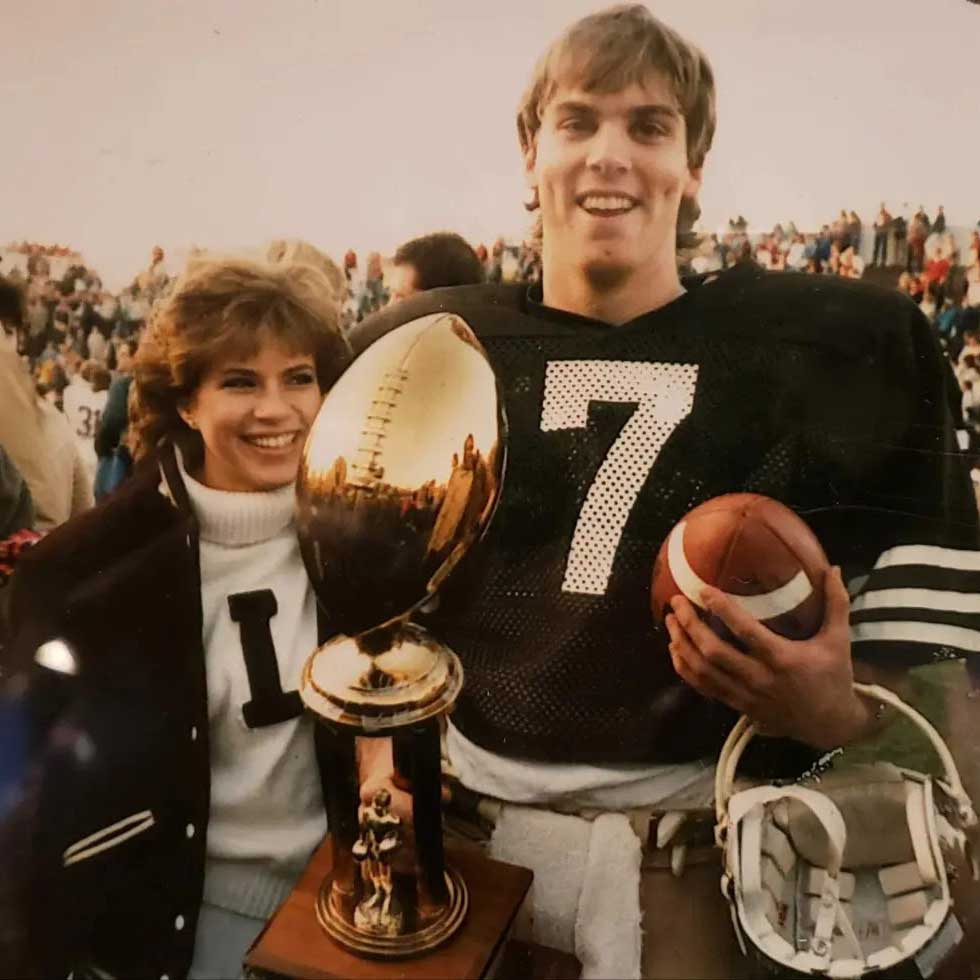Marty stands with his wife, Diane, after winning a VIP trophy at the Lehigh-Lafayette game. 