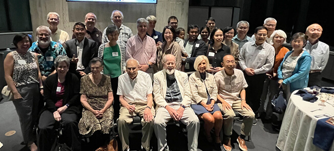 Marv White poses with his former students