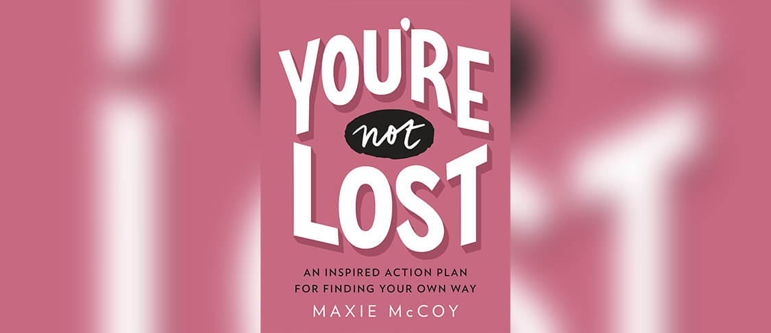 The cover of McCoy’s book “You’re Not Lost,” featuring a pink background and white text.