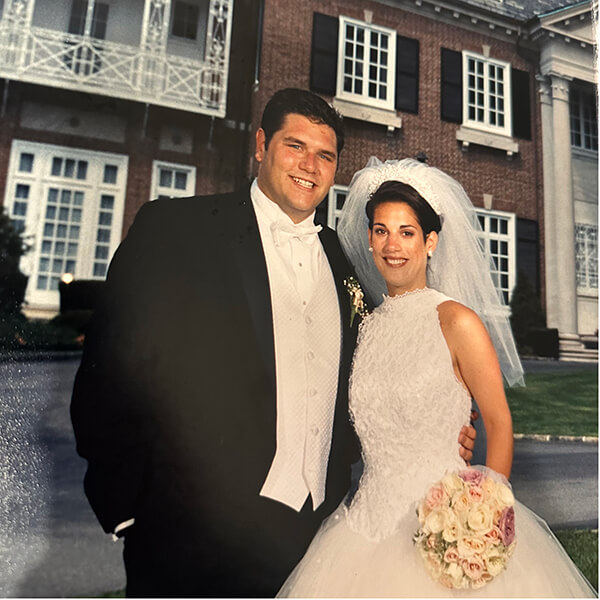 Michael and Maria Constantinou posing at their wedding