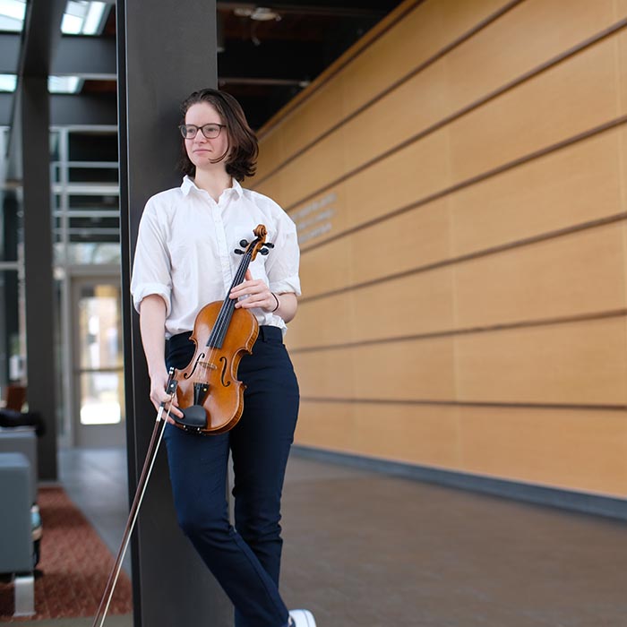 Erin holds violin