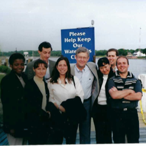 Ned Heindel with students on a dock