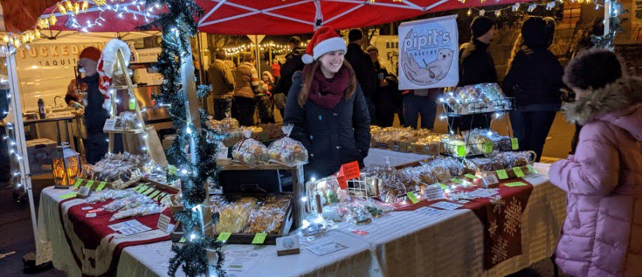 Sarah Kauzmann sells Pipit's Bakery goods at the Perkasie Tree Lighting