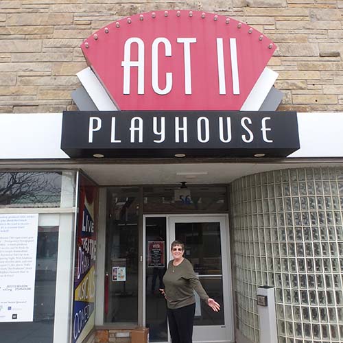 Susan outside theater entrance