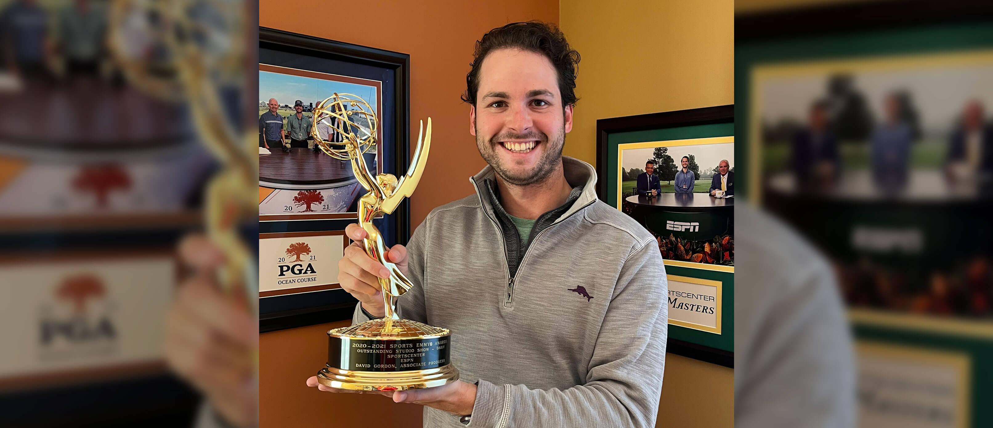 David Gordon ’15 holding his emmy