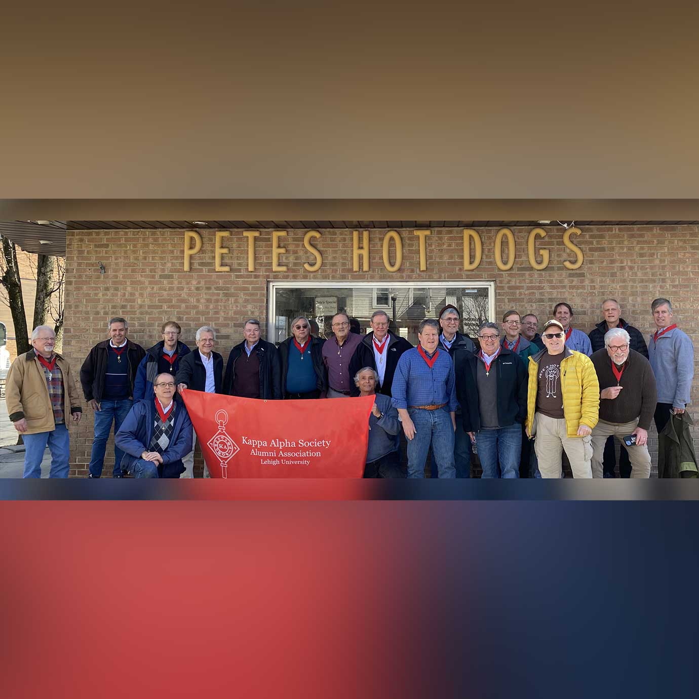The Kappa Alpha Society poses outside Petes Hot Dog Shop.