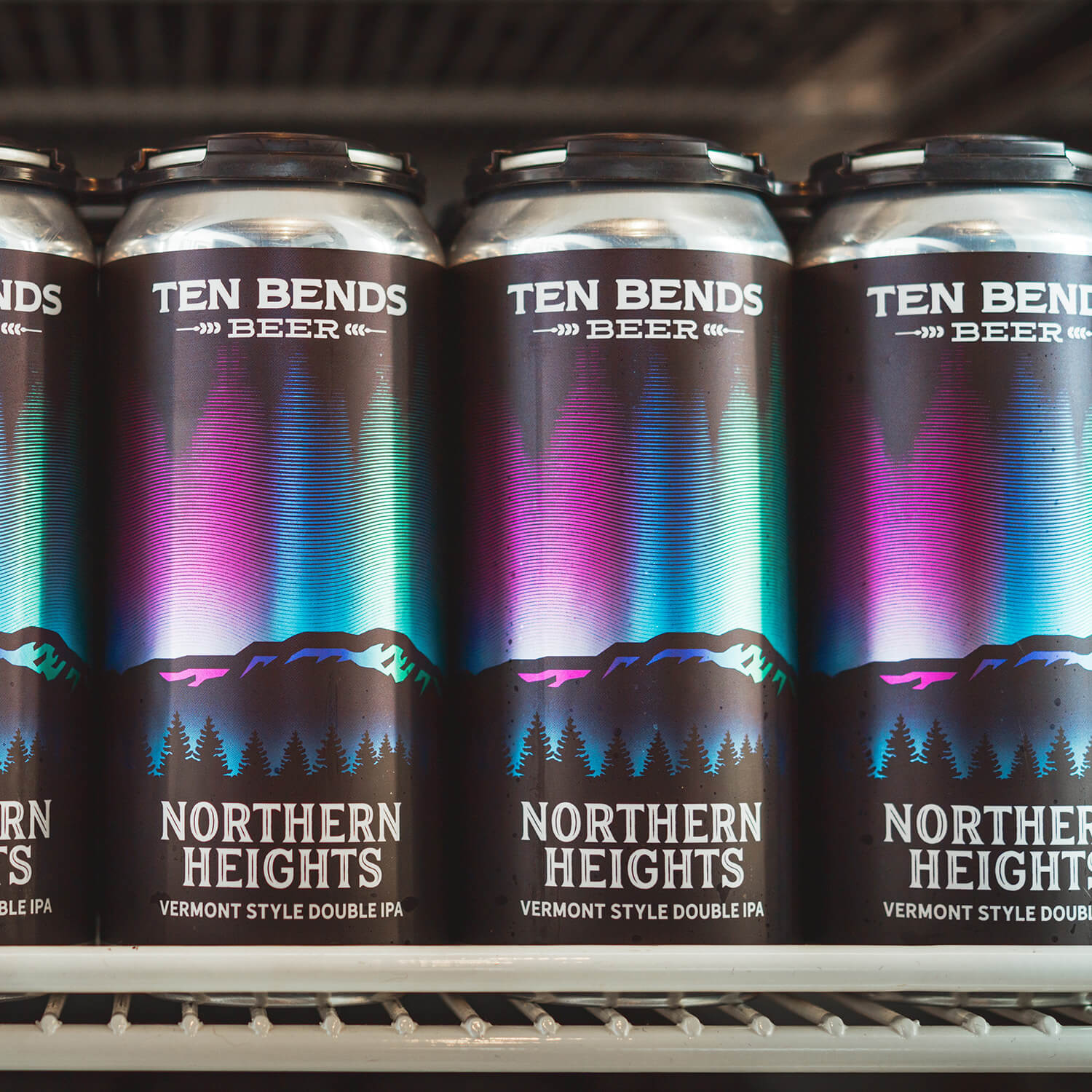 Three cans of Ten Bends Beer brand Double Style IPA "Northern Heights"