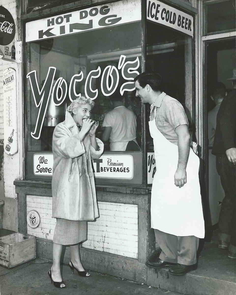 Vintage Yocco's storefront, a man and a woman standing together