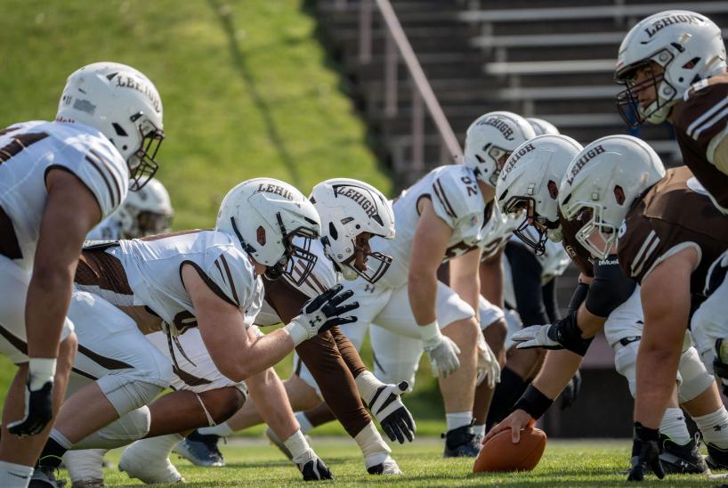 The Lehigh football team in formation and ready to snap the ball.