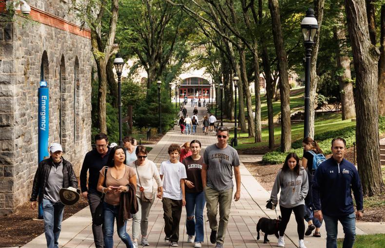 Families walking down Memorial Walkway