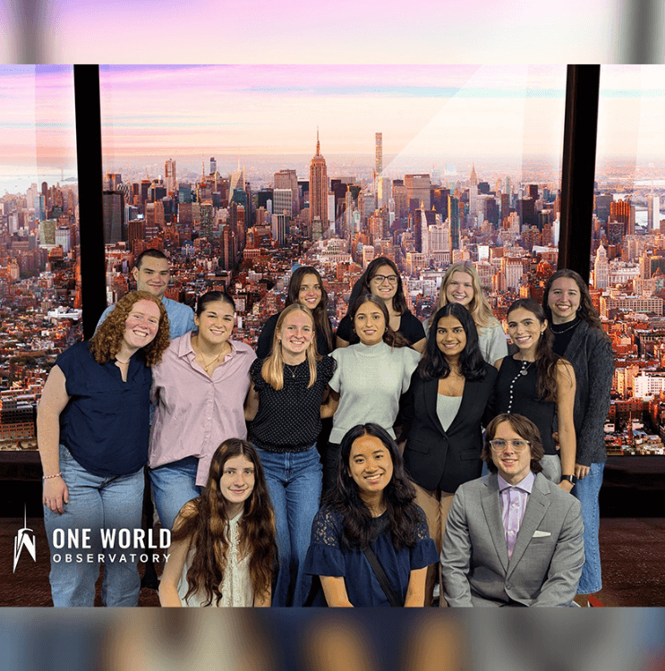 Many Soaring Together Scholars stand for a photo at the top of the World Trade Center Observatory