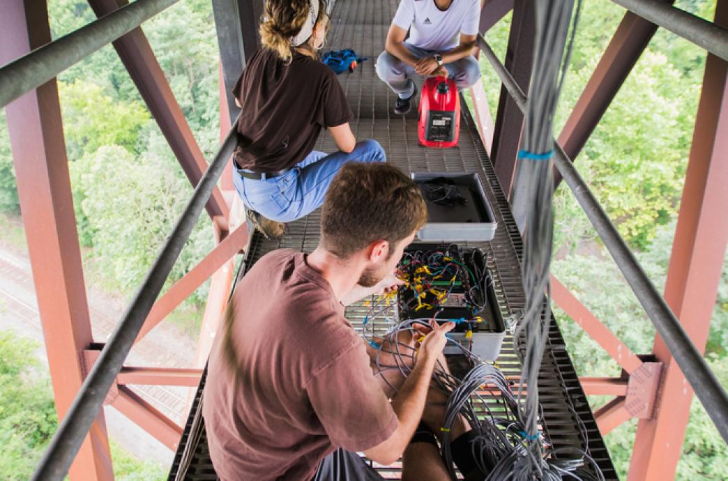 Lehigh engineering students working on a bridge.
