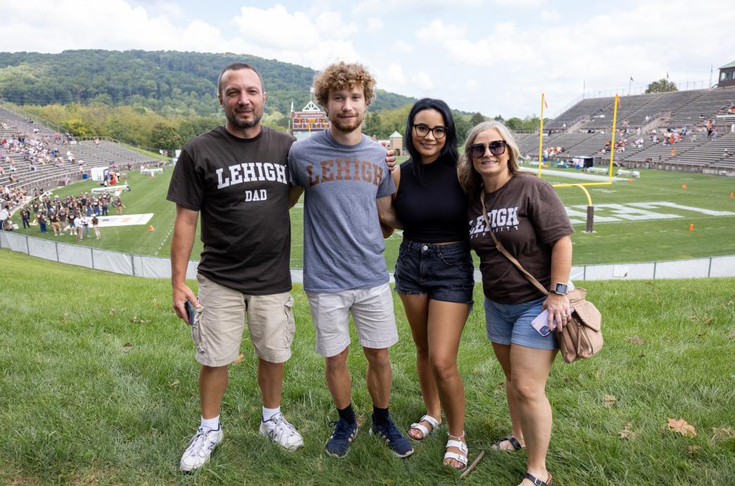 A family sporting their Lehigh gear at the Lehigh vs. Princeton Football Game