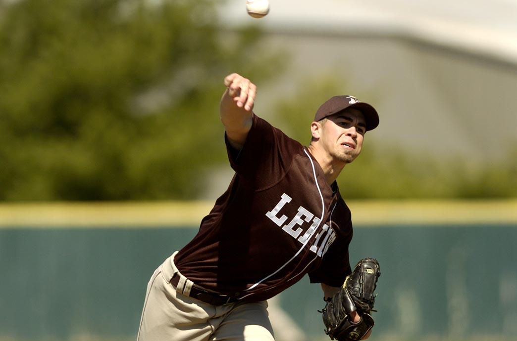 Kyle Collina throws a pitch