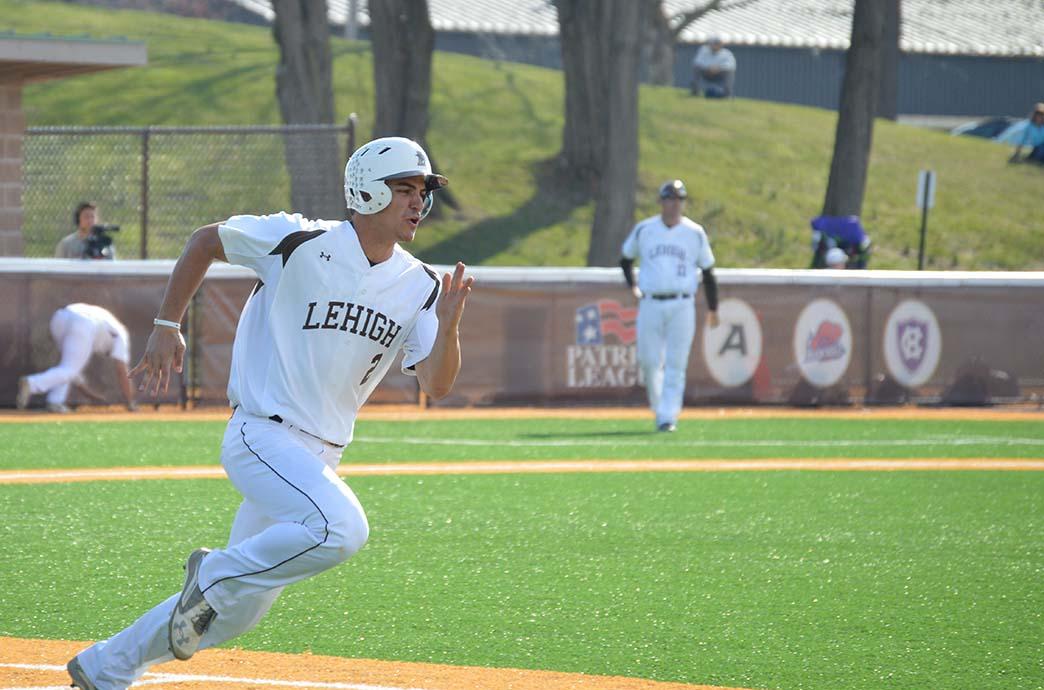 Mike Garzillo runs to first base