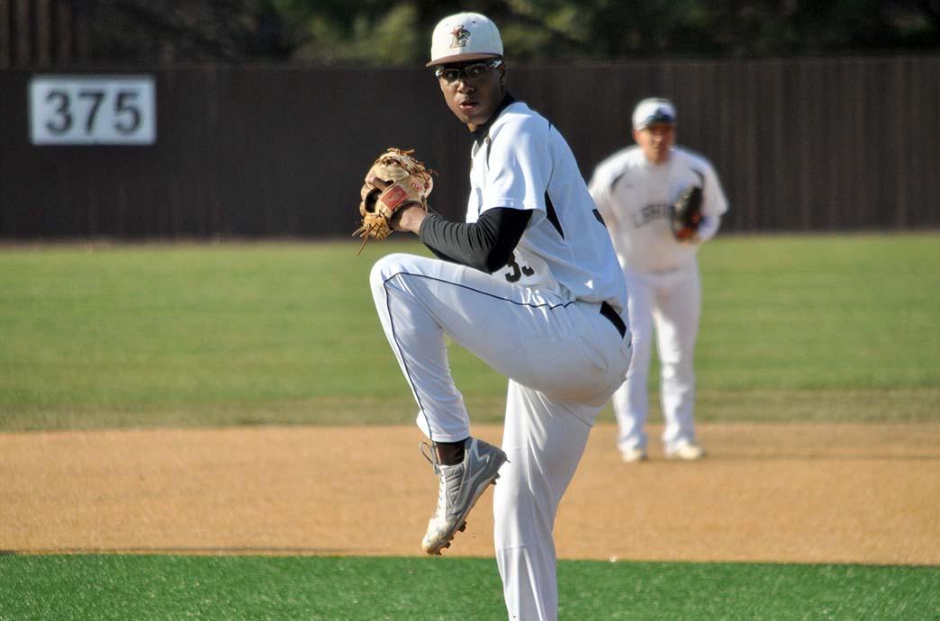 Mark Washington winds up for a pitch