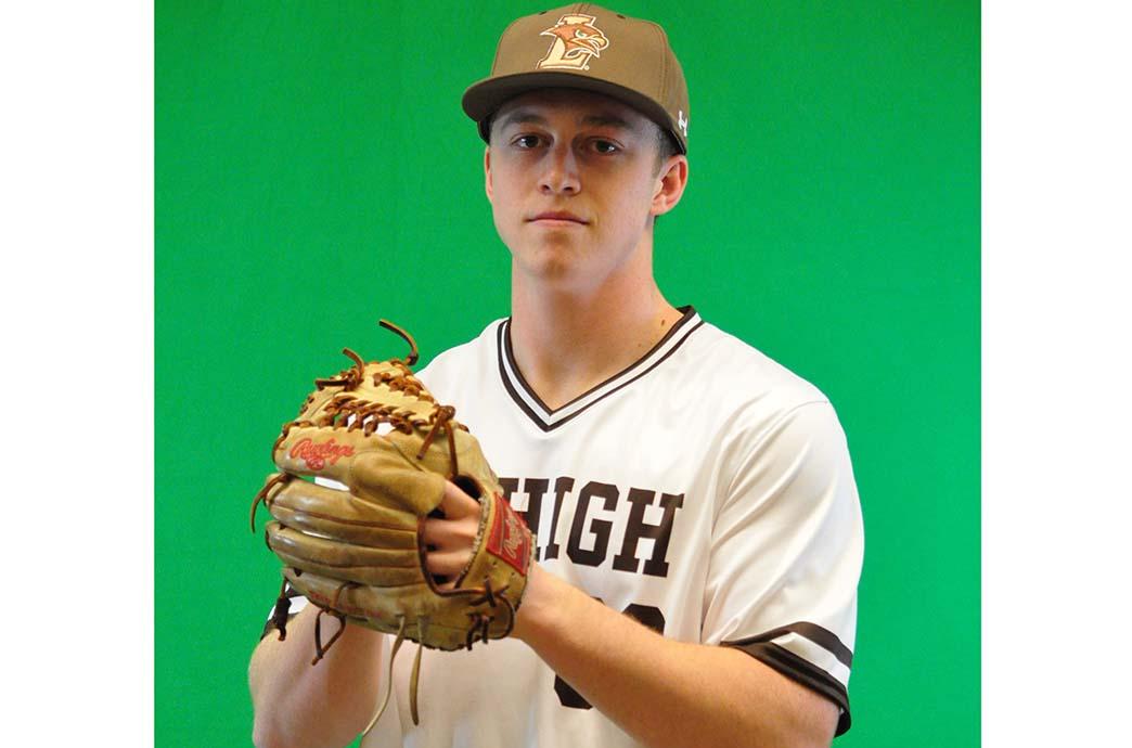 Jason Reynolds holds a ball in his glove
