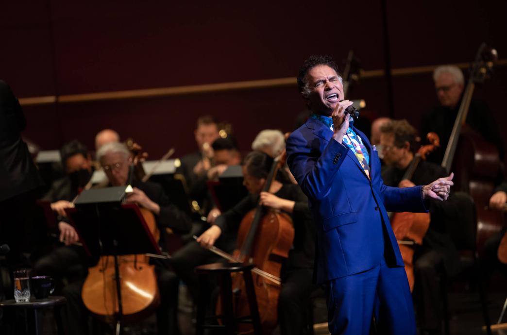 Brian Stokes Mitchell singing on stage with the Philadelphia Orchestra