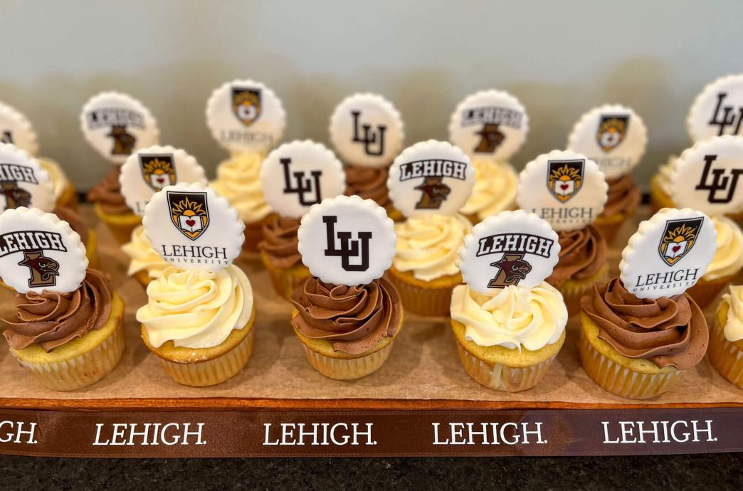 Brown and white cupcakes decorated with Lehigh logos