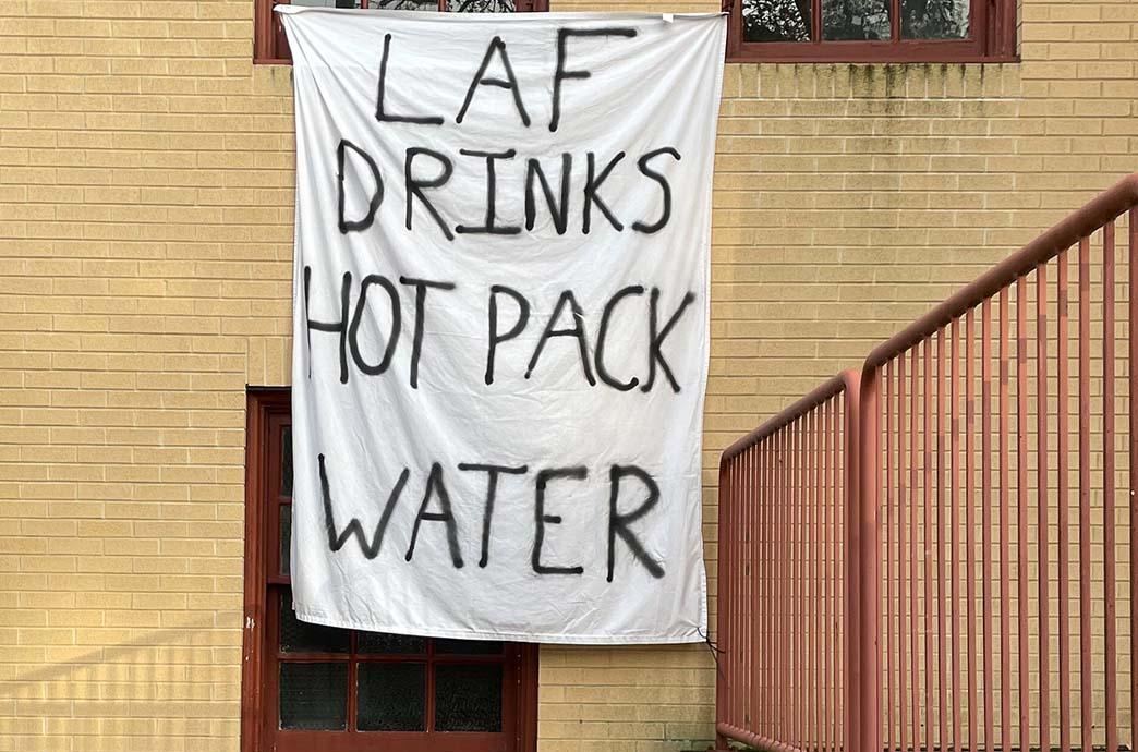 Lehigh-Lafaytte bedsheet reading "Laf drinks hot pack water"