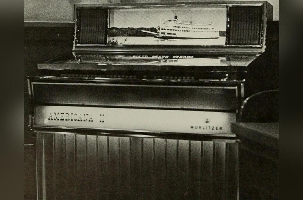 Black and white photo from the 1973 yearbook shows an Americana II jukebox.