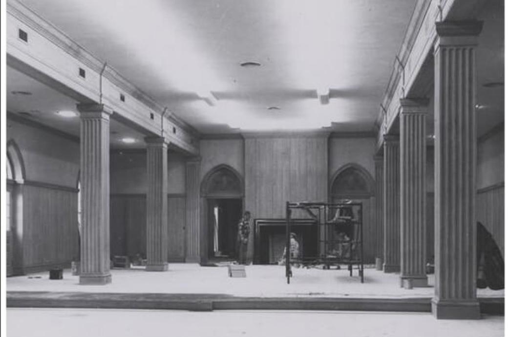 A 1955 black and white photo shows the interior of the University Center student lounge under renovation.