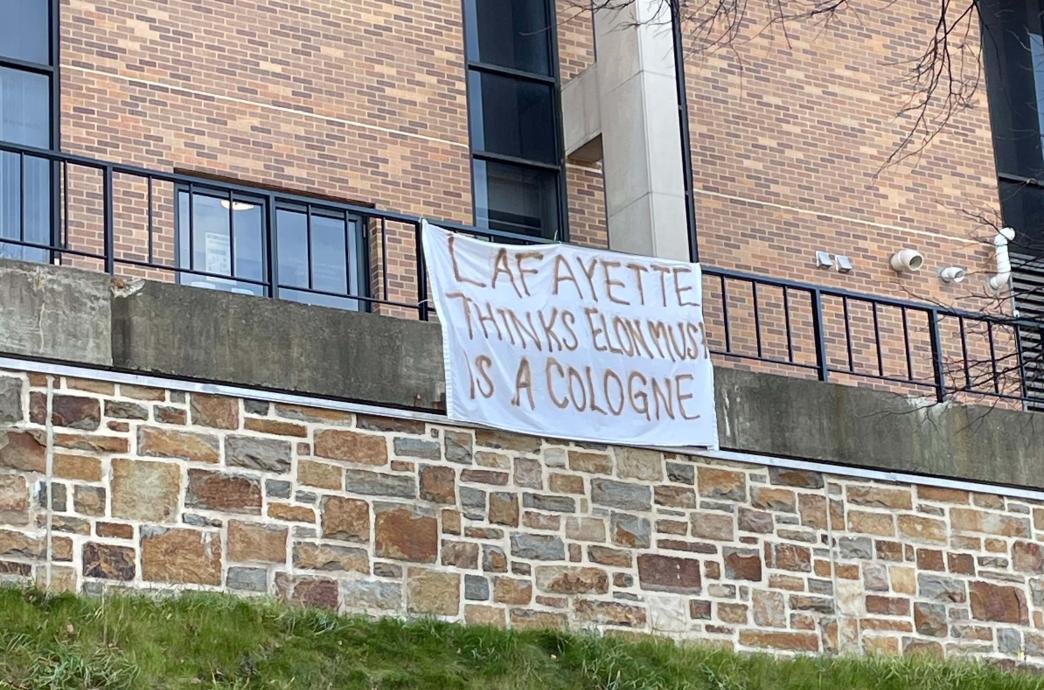 Lehigh bed sheet reading "Lafayette thinks Elon Musk is a cologne."